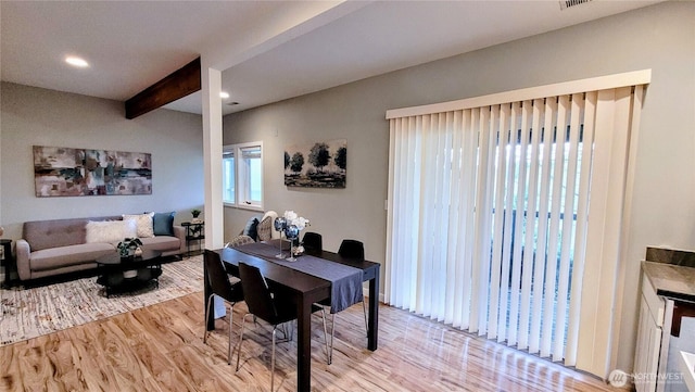 2205 135th Pl SE, Bellevue, WA 98005 - dining room with wood finished floors, beam ceiling, and recessed lighting