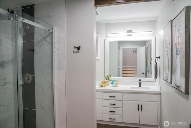 2205 135th Pl SE, Bellevue, WA 98005 - bathroom featuring a marble finish shower and vanity
