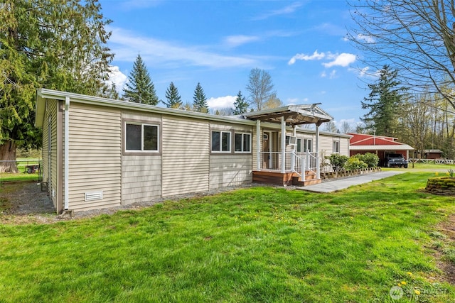 24709 148th Ave E, Graham, WA 98338 - rear view of property featuring a yard