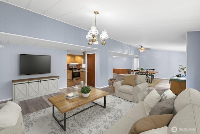 24709 148th Ave E, Graham, WA 98338 - living room featuring a chandelier and light wood finished floors