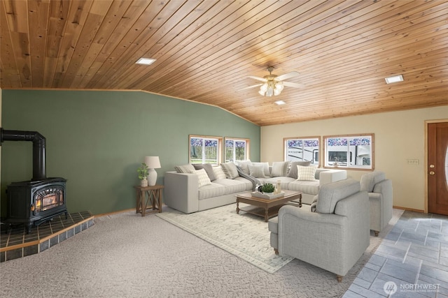 24709 148th Ave E, Graham, WA 98338 - living area featuring lofted ceiling, wooden ceiling, a wood stove, and ceiling fan