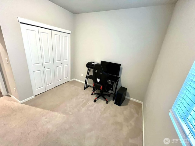 carpeted office with baseboards
