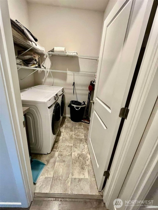 laundry room with laundry area and separate washer and dryer