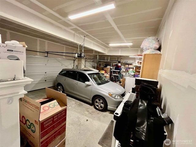 garage featuring a garage door opener