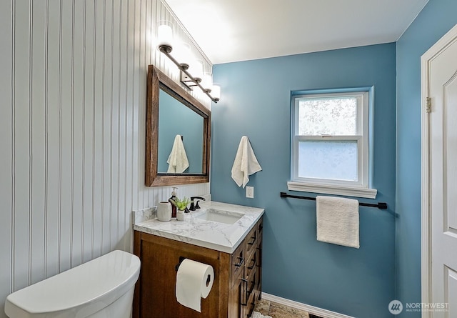 5786 Skagit Pl, Blaine, WA 98230 - bathroom featuring toilet, vanity, and baseboards