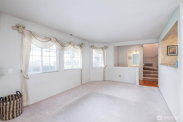 4802 Nassau Ave NE Unit 45, Tacoma, WA 98422 - interior space featuring stairs, carpet, and visible vents