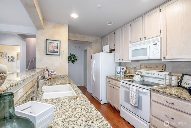 4802 Nassau Ave NE Unit 45, Tacoma, WA 98422 - kitchen with a sink, light stone countertops, white appliances, and dark wood-type flooring