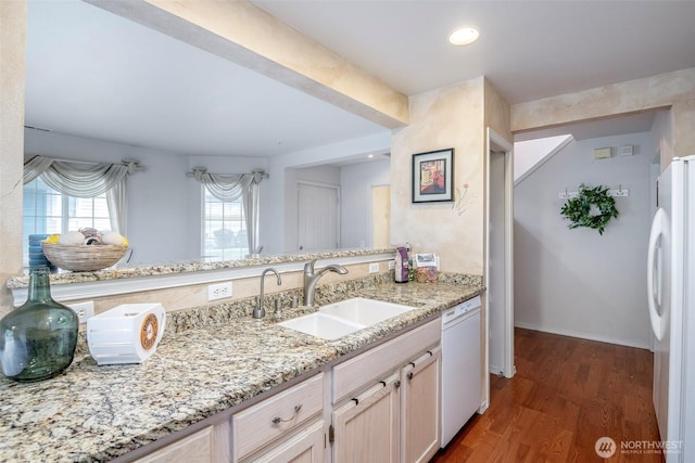 4802 Nassau Ave NE Unit 45, Tacoma, WA 98422 - kitchen featuring baseboards, white appliances, light stone countertops, dark wood finished floors, and a sink