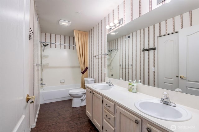 4802 Nassau Ave NE Unit 45, Tacoma, WA 98422 - bathroom featuring a sink, toilet, double vanity, and wallpapered walls