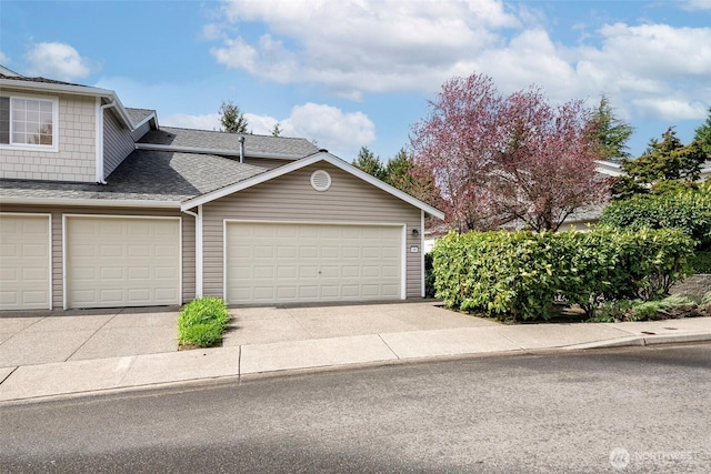 4802 Nassau Ave NE Unit 45, Tacoma, WA 98422 - garage with concrete driveway