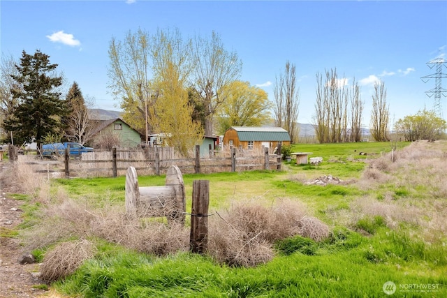 view of yard with fence