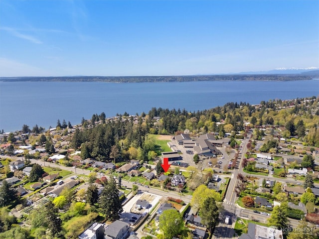 aerial view with a residential view and a water view