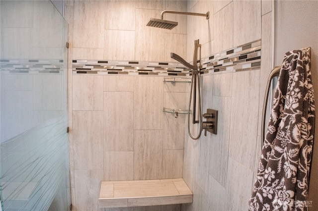 bathroom featuring tiled shower