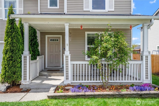 entrance to property with covered porch