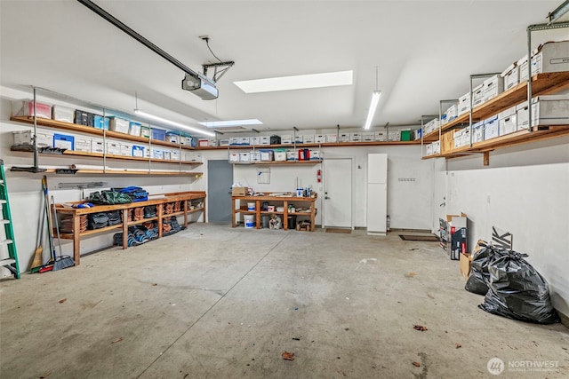 1192 E State Route 4, Cathlamet, WA 98612 - garage with a garage door opener and a workshop area