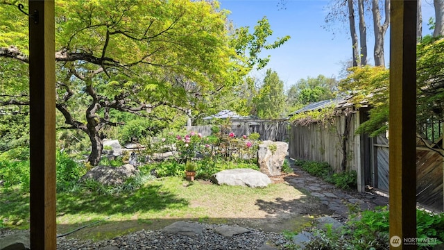 view of yard with fence