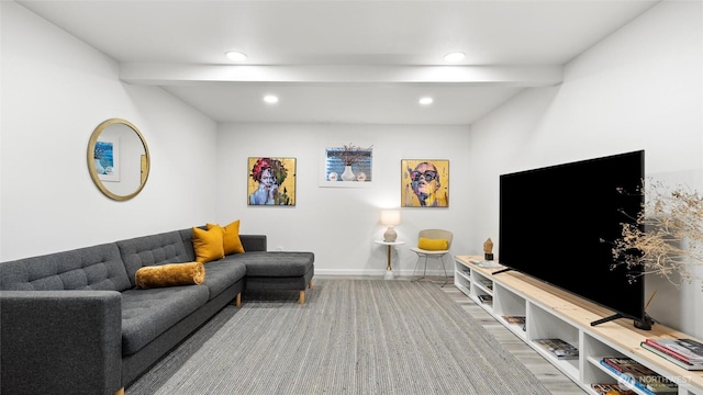 living room featuring recessed lighting, baseboards, wood finished floors, and beamed ceiling