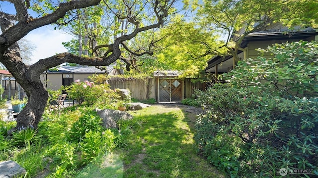 view of yard with fence