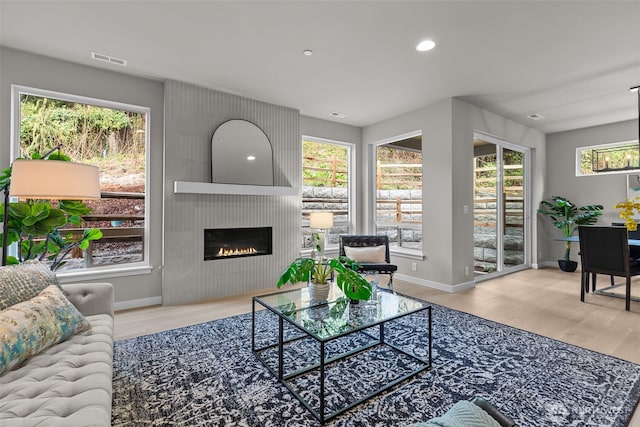 18116 83rd Ave NE, Kenmore, WA 98028 - living area featuring visible vents, baseboards, and wood finished floors