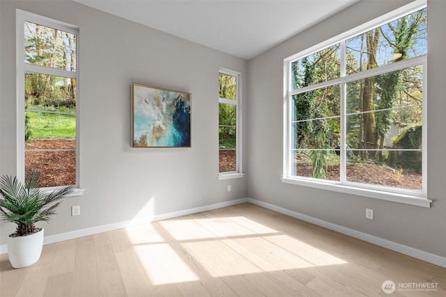 18116 83rd Ave NE, Kenmore, WA 98028 - empty room with wood finished floors and baseboards