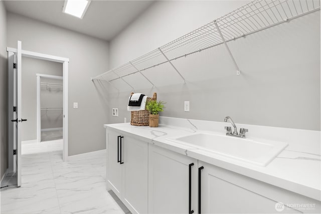 18116 83rd Ave NE, Kenmore, WA 98028 - clothes washing area with laundry area, washer hookup, marble finish floor, a sink, and baseboards
