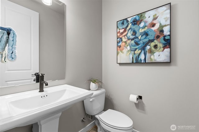18116 83rd Ave NE, Kenmore, WA 98028 - half bathroom featuring baseboards, a sink, and toilet