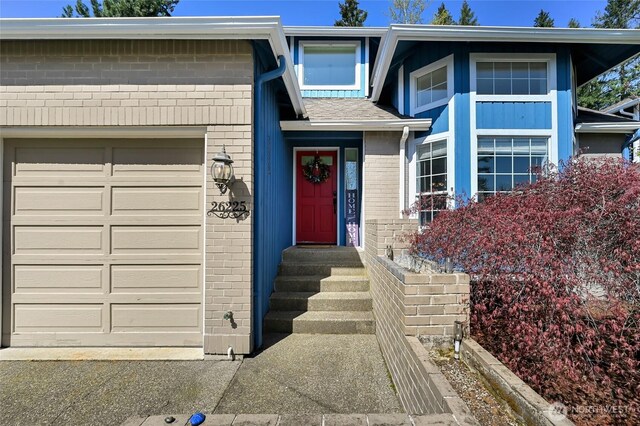 26225 Lake Wilderness Country Club Dr SE, Maple Valley, WA 98038 - view of front of home featuring brick siding and a garage