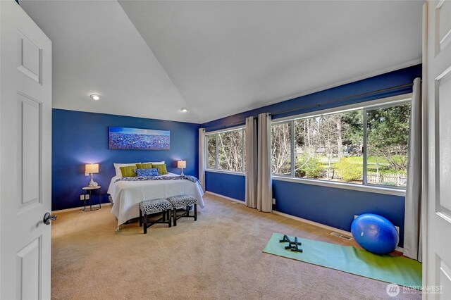 26225 Lake Wilderness Country Club Dr SE, Maple Valley, WA 98038 - bedroom with carpet, visible vents, lofted ceiling, and multiple windows