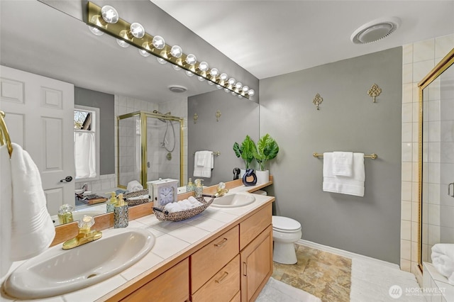26225 Lake Wilderness Country Club Dr SE, Maple Valley, WA 98038 - full bathroom featuring a shower stall, a sink, visible vents, and double vanity