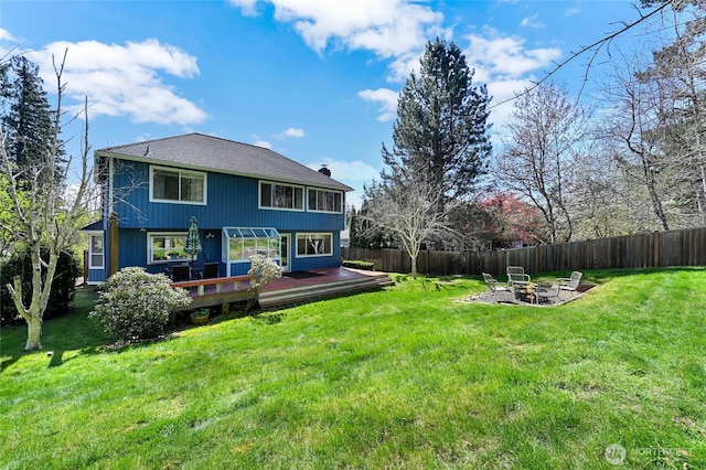 26225 Lake Wilderness Country Club Dr SE, Maple Valley, WA 98038 - rear view of house featuring a fire pit, a yard, a deck, and fence private yard