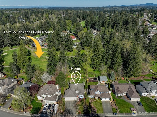 26225 Lake Wilderness Country Club Dr SE, Maple Valley, WA 98038 - aerial view featuring a view of trees and a residential view