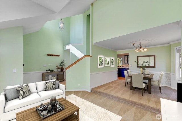 26225 Lake Wilderness Country Club Dr SE, Maple Valley, WA 98038 - living room with vaulted ceiling, baseboards, a notable chandelier, stairway, and carpet floors