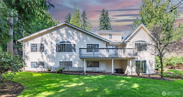 2210 NE 229th Ave, Sammamish, WA 98074 - back of house at dusk featuring a yard and a deck