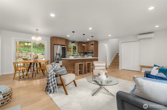 107 219th Pl SE, Bothell, WA 98021 - living room with light wood finished floors, stairway, a wall mounted air conditioner, and recessed lighting