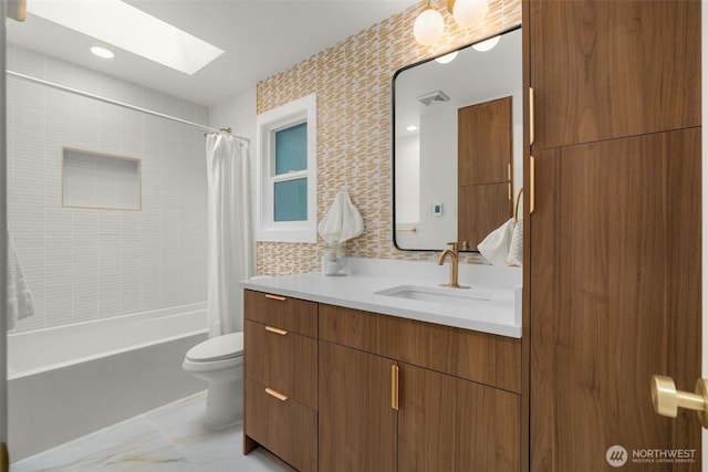 107 219th Pl SE, Bothell, WA 98021 - full bath featuring toilet, a skylight, shower / bathtub combination with curtain, marble finish floor, and vanity