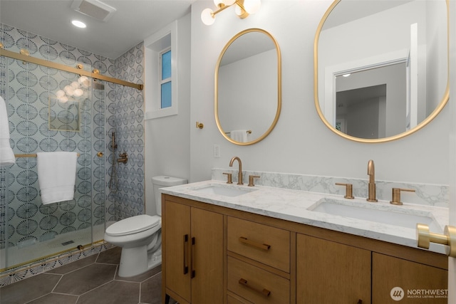 107 219th Pl SE, Bothell, WA 98021 - full bathroom featuring toilet, tile patterned flooring, a stall shower, and a sink