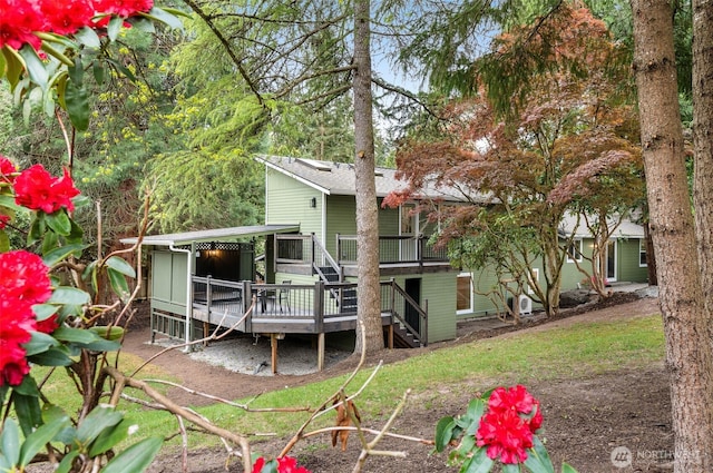 107 219th Pl SE, Bothell, WA 98021 - back of house with a wooden deck and stairs