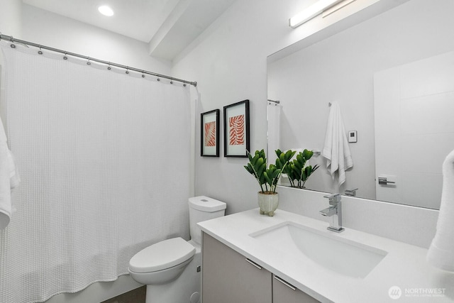 full bathroom with recessed lighting, toilet, vanity, and shower / bathtub combination with curtain