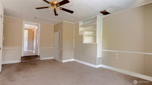 2125 N Highland St, Tacoma, WA 98406 - spare room with crown molding, ceiling fan, and carpet floors