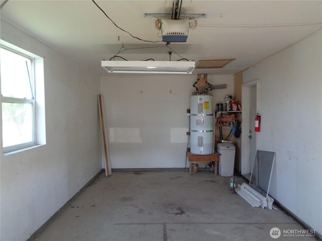 5 Orchard Loop N, Tonasket, WA 98855 - garage with strapped water heater and a garage door opener