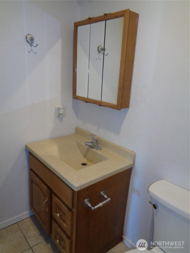 5 Orchard Loop N, Tonasket, WA 98855 - bathroom with vanity, tile patterned flooring, and toilet