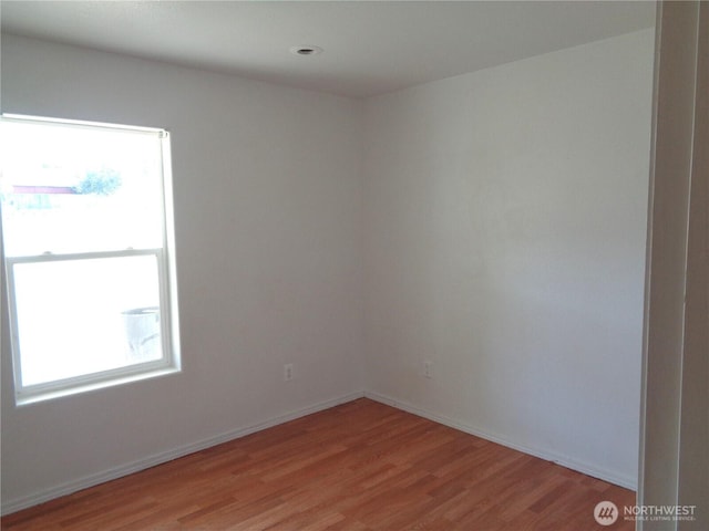 5 Orchard Loop N, Tonasket, WA 98855 - unfurnished room with light wood-style floors and baseboards