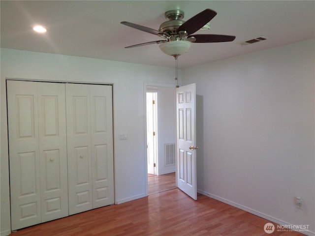 5 Orchard Loop N, Tonasket, WA 98855 - unfurnished bedroom featuring visible vents, baseboards, wood finished floors, and a closet