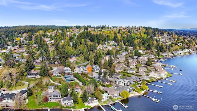 aerial view featuring a water view and a residential view