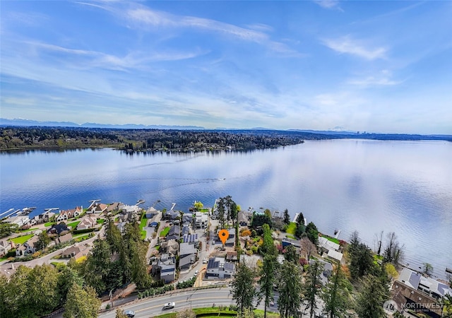 birds eye view of property featuring a water view and a residential view