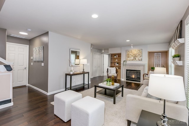 1231 148th Pl SE, Mill Creek, WA 98012 - living room featuring baseboards, wood finished floors, a tile fireplace, and recessed lighting