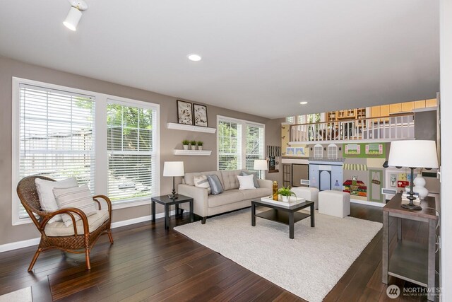 1231 148th Pl SE, Mill Creek, WA 98012 - living room featuring dark wood-style flooring, baseboards, and recessed lighting