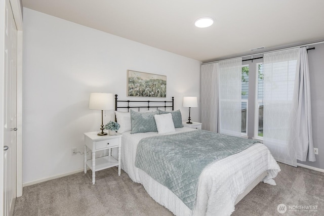 1231 148th Pl SE, Mill Creek, WA 98012 - carpeted bedroom featuring baseboards