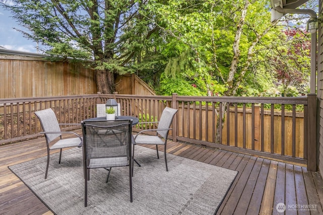 1231 148th Pl SE, Mill Creek, WA 98012 - wooden deck with outdoor dining space