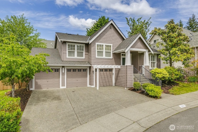 1231 148th Pl SE, Mill Creek, WA 98012 - view of front facade featuring driveway, a garage, and roof with shingles